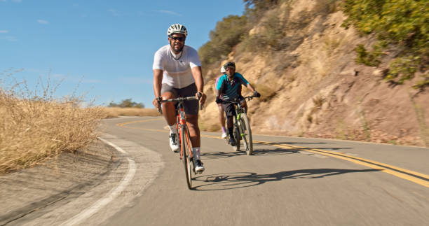 istock Road Cyclist and Mountain Biker Riding Together 1431102995