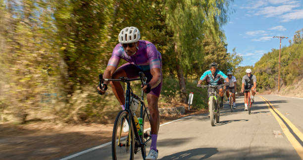 istock Black Cyclists Attacking Turns in the Hills 1431103055