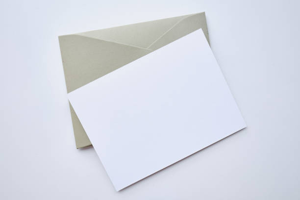 istock Paper envelopes on a light background. New mail, write a message. Send and receive mail. Postal delivery service. Empty envelope, empty space. Communication with people, paperwork. Envelope close-up 1431103381