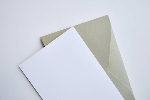 istock Paper envelopes on a light background. New mail, write a message. Send and receive mail. Postal delivery service. Empty envelope, empty space. Communication with people, paperwork. Envelope close-up 1431103402