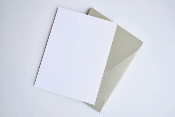 istock Paper envelopes on a light background. New mail, write a message. Send and receive mail. Postal delivery service. Empty envelope, empty space. Communication with people, paperwork. Envelope close-up 1431103414