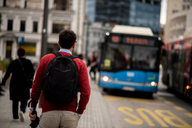 istock Young and modern businessman waiting for a bus 1431104270