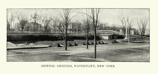ammunition and round shot cannonballs stored at arsenal grounds, watervliet, new york, 1890s - arsenal stock illustrations