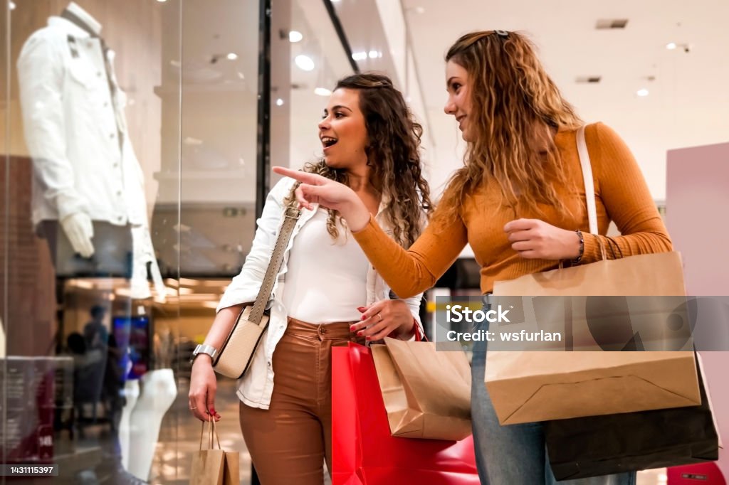 Two women making shopping. Photo of two women making shopping. Shopping Mall Stock Photo