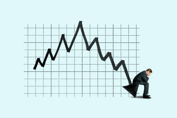 istock Distressed Man Sitting On Arrow At Bottom Of Bear Market Chart 1431116962