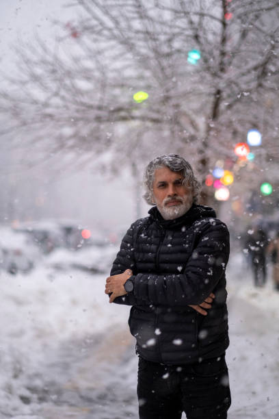 istock Man walking on the street at winter 1431119409