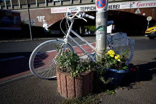 Cologne, Germany October 06, 2022: Ghost Bike roadside memorial in cologne ehrenfeld