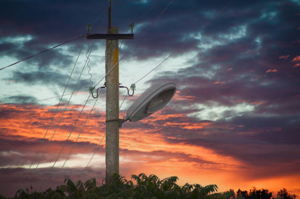 Electric lines overhaead, power line against bles sky.