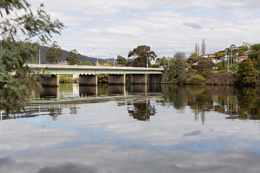View of traffic bridge crossing the Huon River on the edge of the township of Huonville south of Hobart