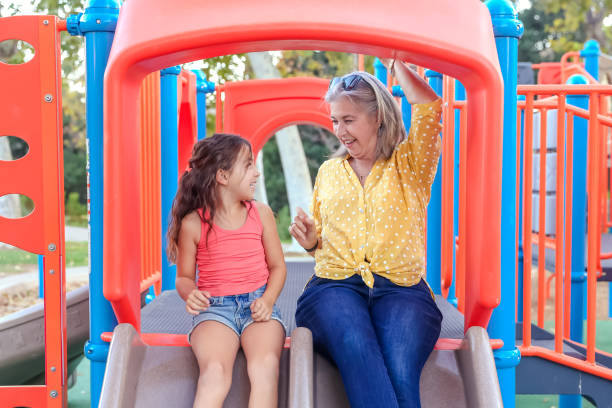 istock Grandma and granddaughter playing at a park 1431138492