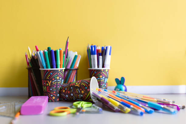 istock Color pencils on a yellow wall background 1431138533
