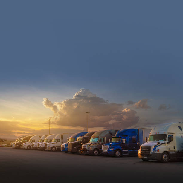 Semi trucks parked on a resting station in Texas, USA  at sunset stock photo