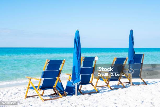 Beach Chairs And Umbrella Stock Photo - Download Image Now - Armchair, Beach, Beach Umbrella