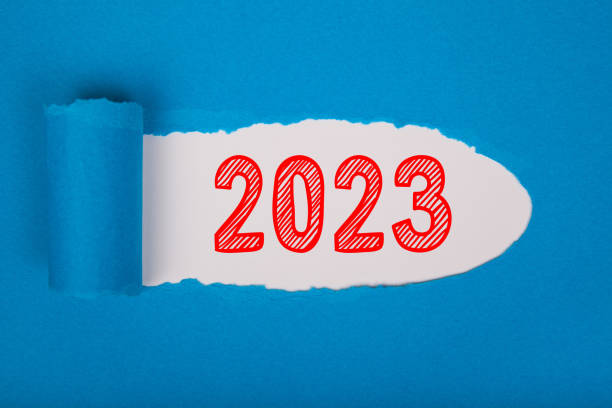 istock Torn Paper With Happy New Year 2023 On White Background 1431150441