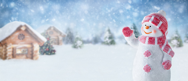 Modern red seasonal background with a cute happy snowman in the snow, ideal for Christmas or winter season