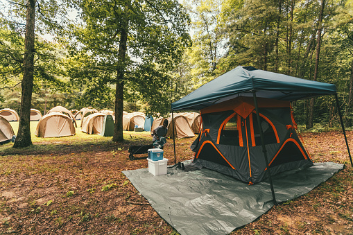 woman is setting up her campsite