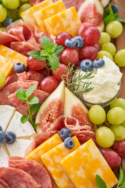 "Cheese board" with cheese, ham and fresh fruit