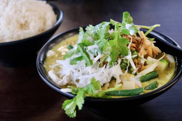 istock Green chicken curry and jasmine rice at a Thai restaurant in Sydney 1431175969