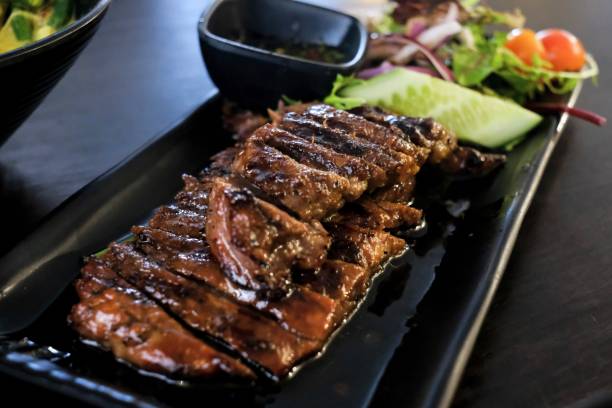istock Grilled tiger beef with salad at a Thai restaurant in Sydney 1431177011