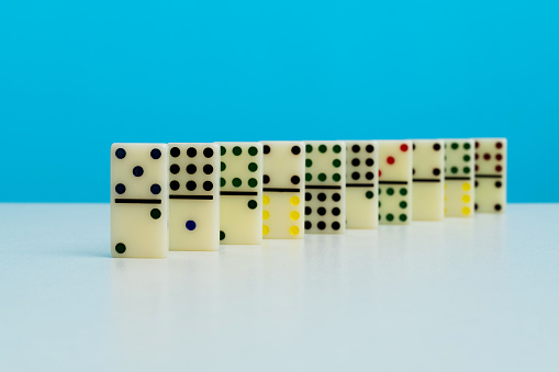 Domino pieces standing in a row