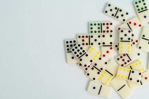 female hand playing dominoes,gambling and hobby