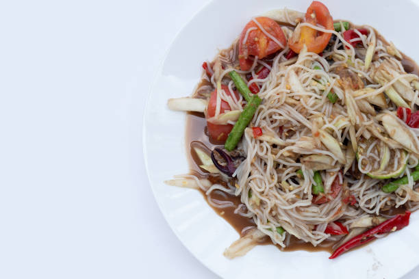 istock Spicy green papaya salad with vermicelli on white 1431191916