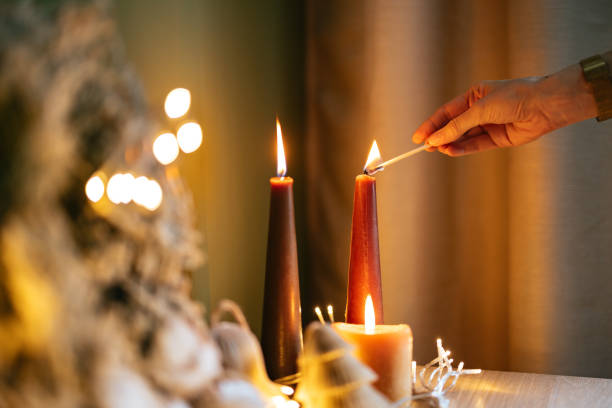 istock Unrecognizable Woman Making Christmas Atmosphere At Home 1431196400