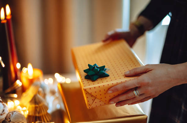 istock An Anonymous Woman Preparing Christmas Presents 1431196480