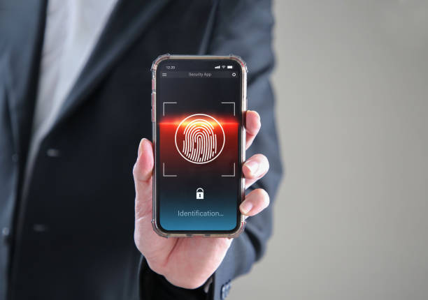istock Businessman hand fingerprint scanning screen to access personal user online. 1431207376