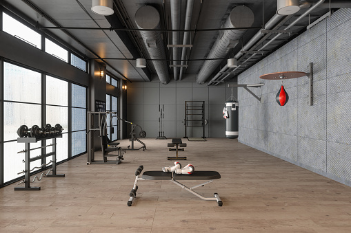 Modern Gym Interior With Boxing Bag, Workout And Training Equipments