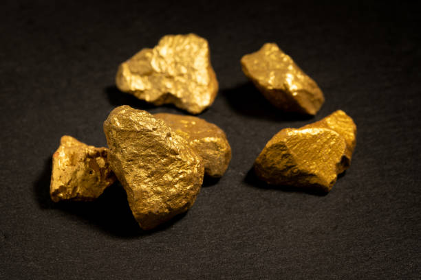istock The pure gold ore found in the mine on black background 1431215998
