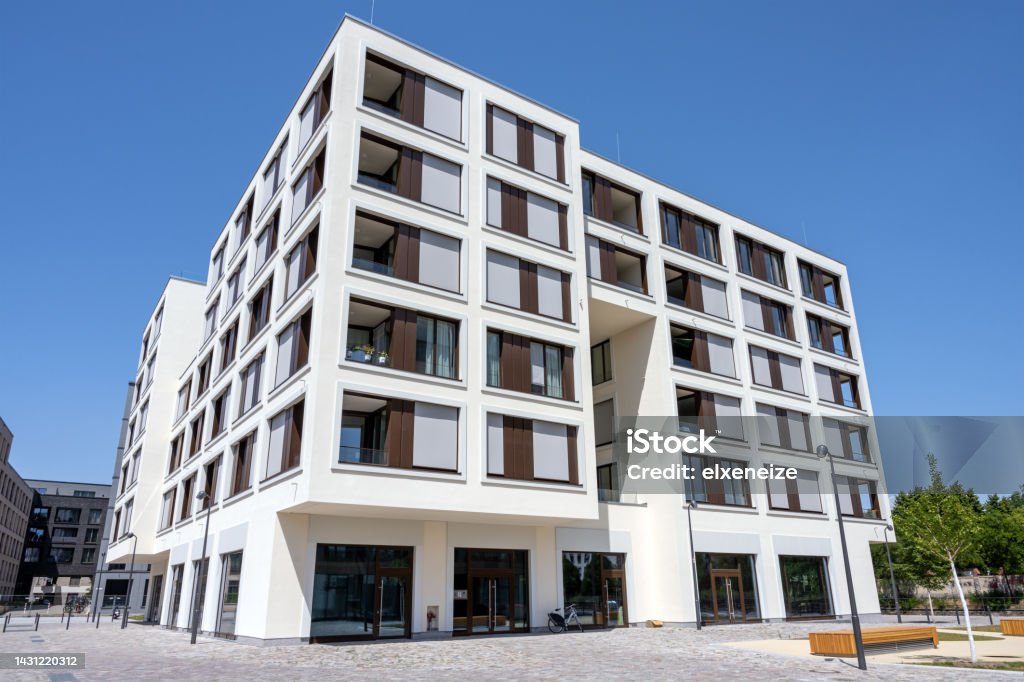 Modern luxury multi-family apartment building Modern luxury multi-family apartment building seen in Berlin, Germany Apartment Stock Photo