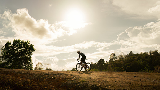 Cyclists practicing on gravel roads