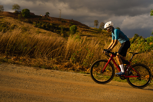 Cyclists practicing on gravel roads