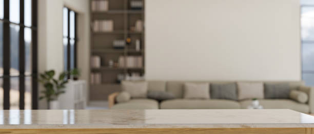 istock Empty mockup space on marble table over blurred comfortable Scandinavian living room 1431222732
