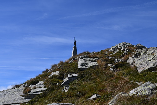 The statue of the Redeemer, on the summit of Mombarone, the border peak between Piedmont and Valle d'Aosta