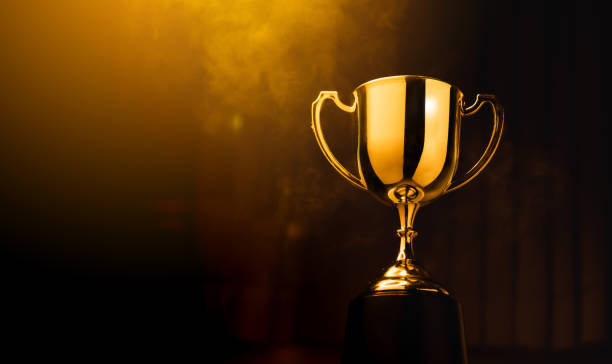 istock Gold Trophy competition in the dark with smoke and with copy space 1431233839