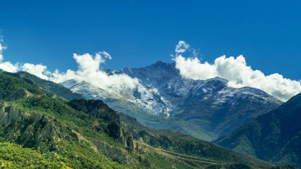 istock Gorgeous mountain landscape with clouds in a bright sun light 1431234057