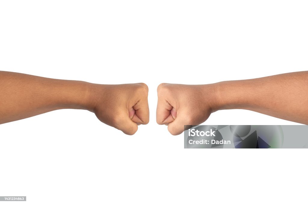 symmetrical fist bump  on white background man hand of symmetrical fist bump isolated on white background Adult Stock Photo