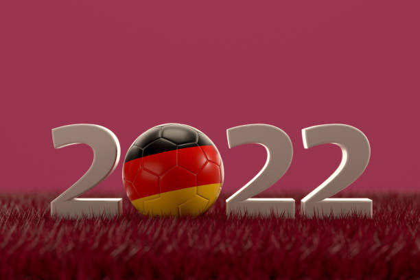 istock Soccer Ball with Germany Flag on grass field 1431254054