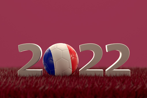 3d rendering of soccer ball with France flag on a grass field.