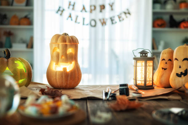 istock Carving pumpkin on the table at home 1431258349