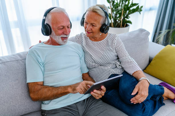 istock Senior couple listening music 1431261108