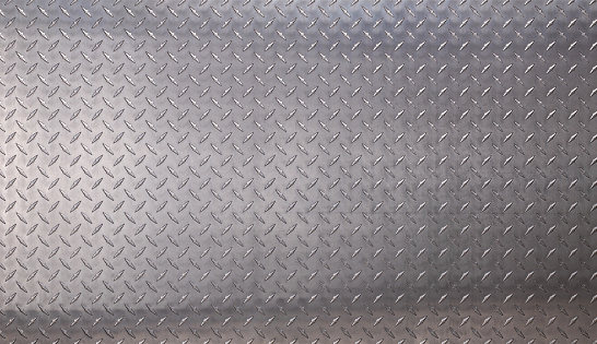 diamond metal texture. reflective steel plate as background.