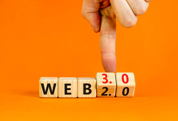 istock WEB 2.0 or 3.0 symbol. Businessman turns wooden cubes and changes concept words WEB 2.0 to WEB 3.0. Beautiful orange table orange background copy space. Business technology and WEB 2.0 or 3.0 concept. 1431281599
