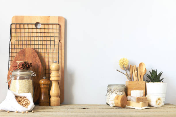 istock Kitchen utensils and tableware made of natural eco-friendly materials on a wooden table. The zero waste concept 1431294149