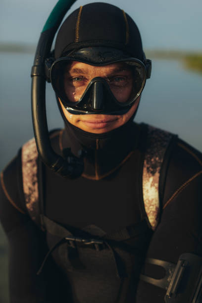 istock Young man wearing a snorkeling gear 1431297258
