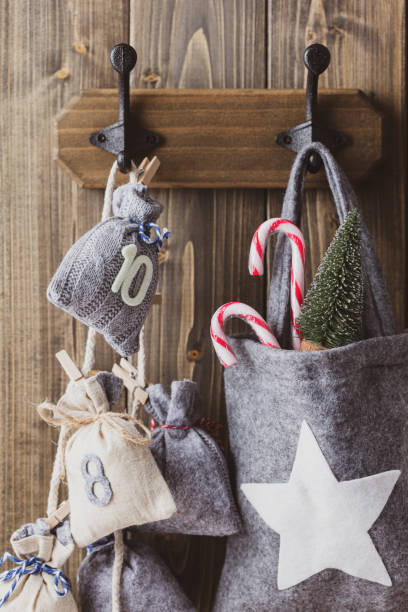 istock Hanging Christmas bags with various ornaments. 1431300393