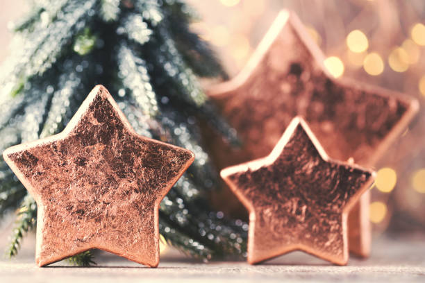 istock Christmas bronze decoration. Holiday decorations bronze on bokeh background. 1431306667