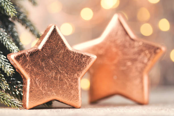 istock Christmas bronze decoration. Holiday decorations bronze on bokeh background. 1431307165
